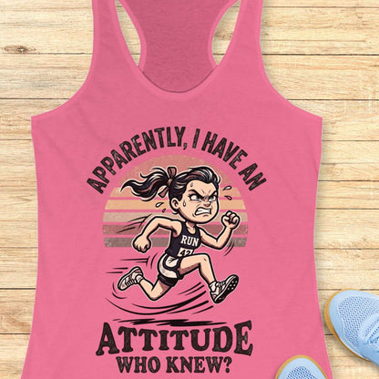 Pink tank top with a graphic of a running person and text on a wooden surface