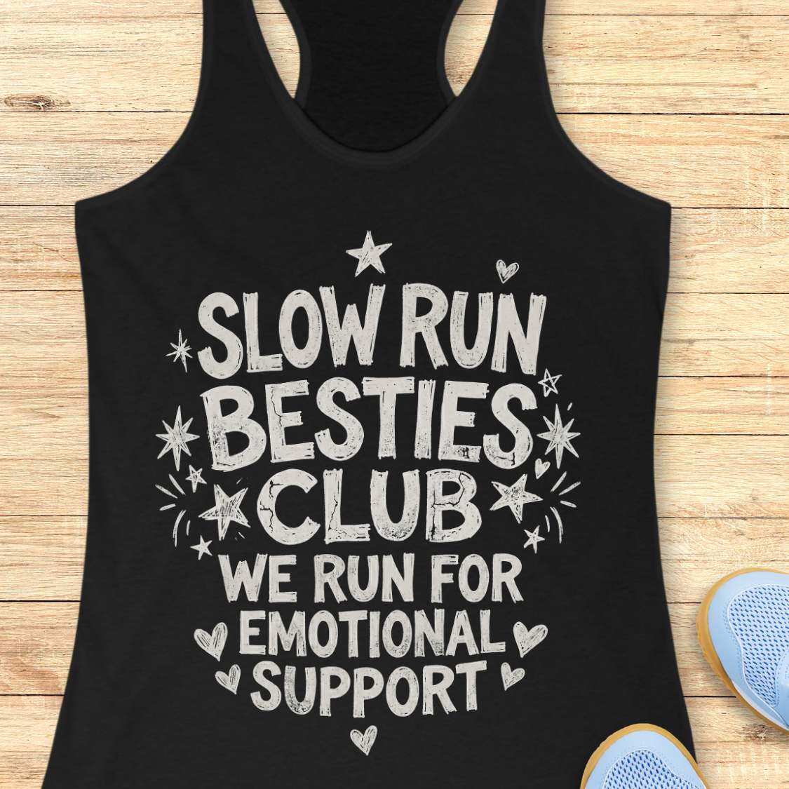 black tank top with 'Slow Run Besties Club' text on a wooden surface