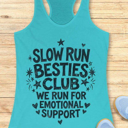 Turquoise tank top with 'Slow Run Besties Club' text on a wooden surface