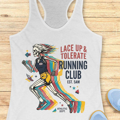white Tank top with skeleton running design and text Lace up & tolerate running club, on a wooden surface