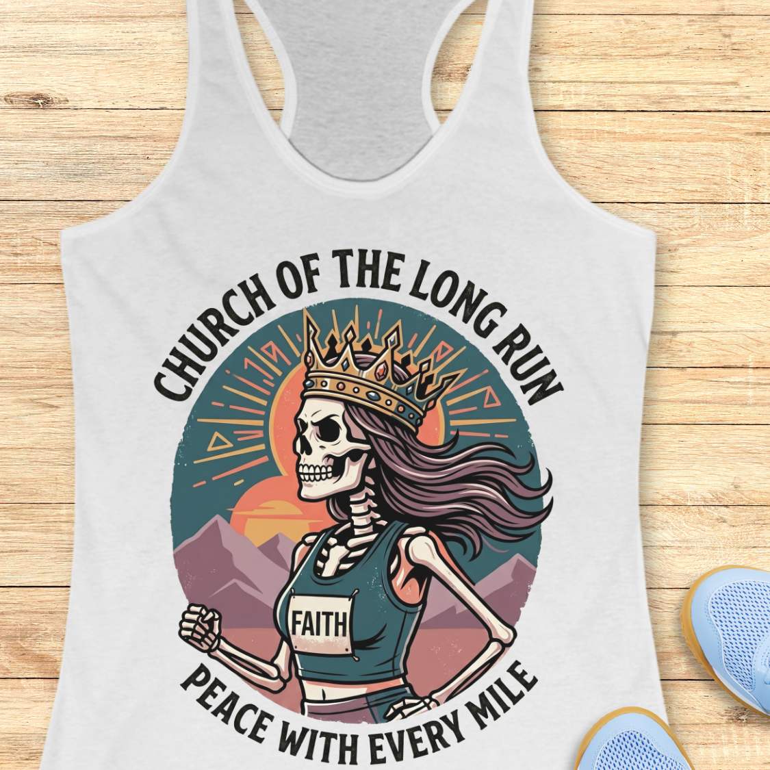 white Tank top with skeleton design and text Church of the long run, peace with every mile, on a wooden surface