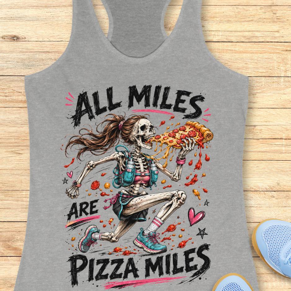 Gray tank top with skeleton eating pizza graphic and 'All Miles are Pizza Miles' text on a wooden surface.
