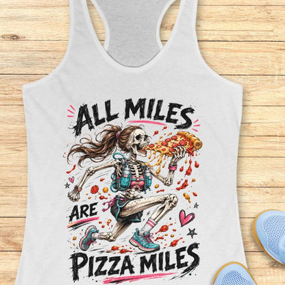 Gray tank top with skeleton design and 'All Miles are Pizza Miles' text on a wooden surface.