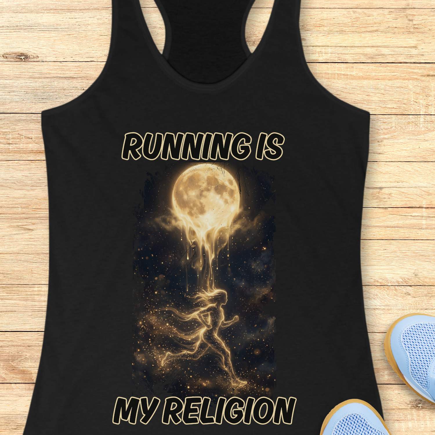 Black tank top with 'Running is my Religion' graphic on a wooden surface