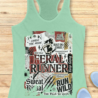 Mint green tank top with graphic design and text on a wooden surface