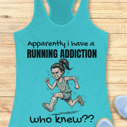 Turquoise tank top with running-themed design and text  'apparently I have a running addiction. who knew??'  on a wooden surface