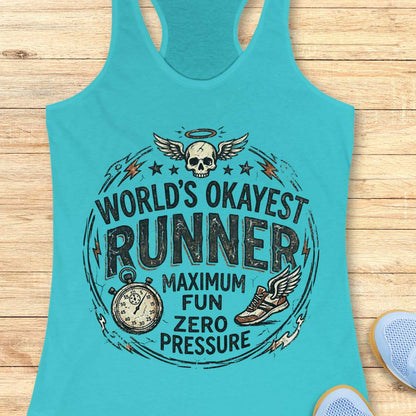 Turquoise tank top with 'World's Okayest Runner maximum fun, zero pressure' graphic on a wooden surface