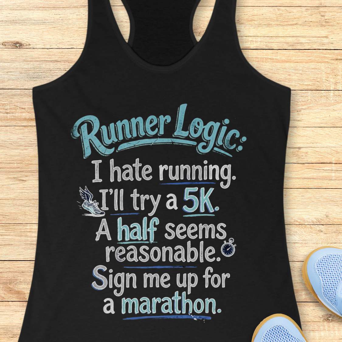 Black tank top with humorous text design on a wooden surface