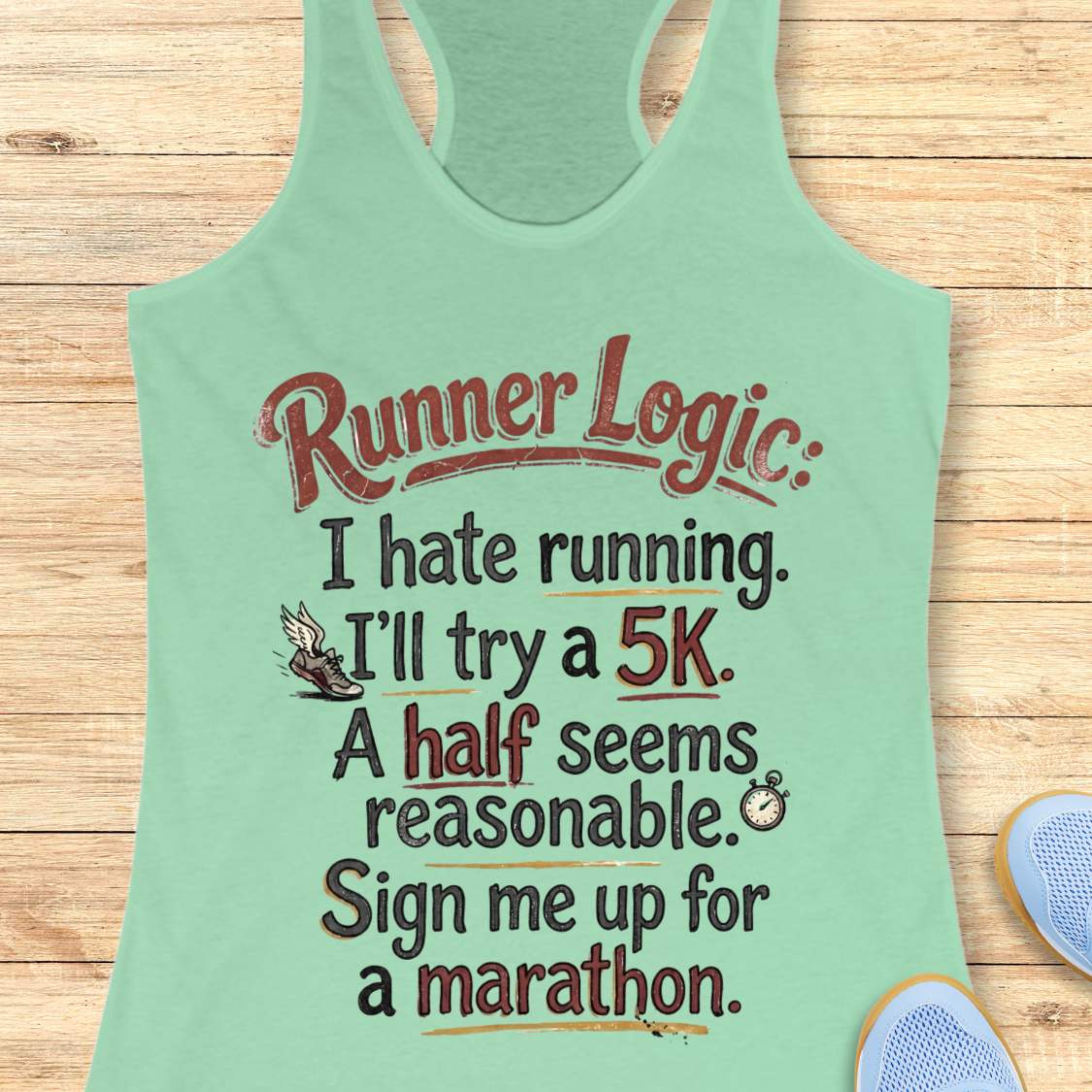 Light green tank top with humorous running text on a wooden surface
