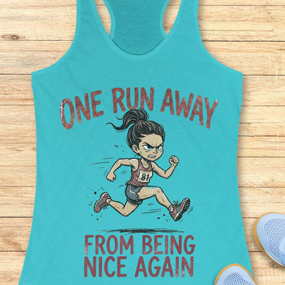 Turquoise tank top with a graphic of a runner and text 'one run away from being nice again',  on a wooden surface