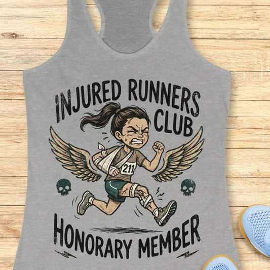 grey tank top with 'Injured Runners Club Honorary Member' graphic on a wooden surface