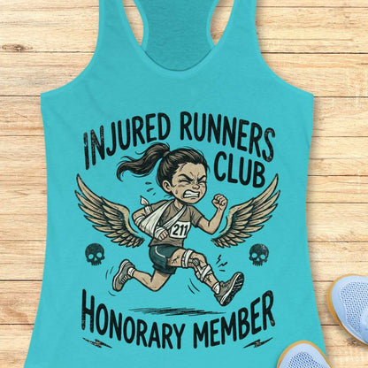 Turquoise tank top with 'Injured Runners Club Honorary Member' graphic on a wooden surface