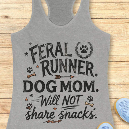 Gray tank top with 'Feral Runner, Dog Mom, Will Not Share Snacks' text on a wooden surface