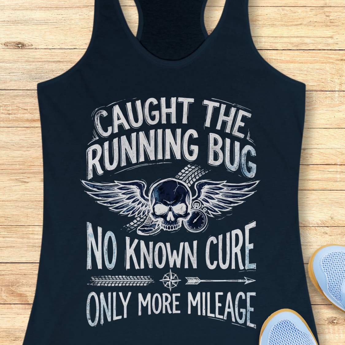 navy tank top with skull and text 'caught the running bug. no known cure. only more mileage', design on a wooden surface