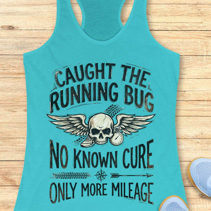 Turquoise tank top with skull and text 'caught the running bug. no known cure. only more mileage', design on a wooden surface