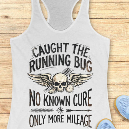 white tank top with skull and text 'caught the running bug. no known cure. only more mileage', design on a wooden surface