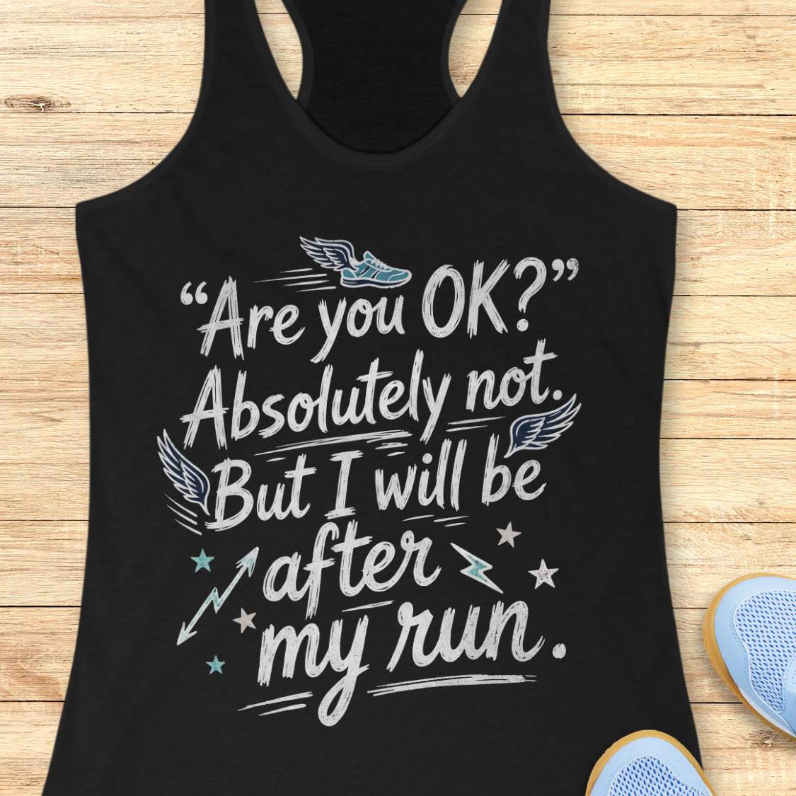 Black tank top with humorous running text 'Are you ok? Absolutely not. But I will be after my run.', design on a wooden surface