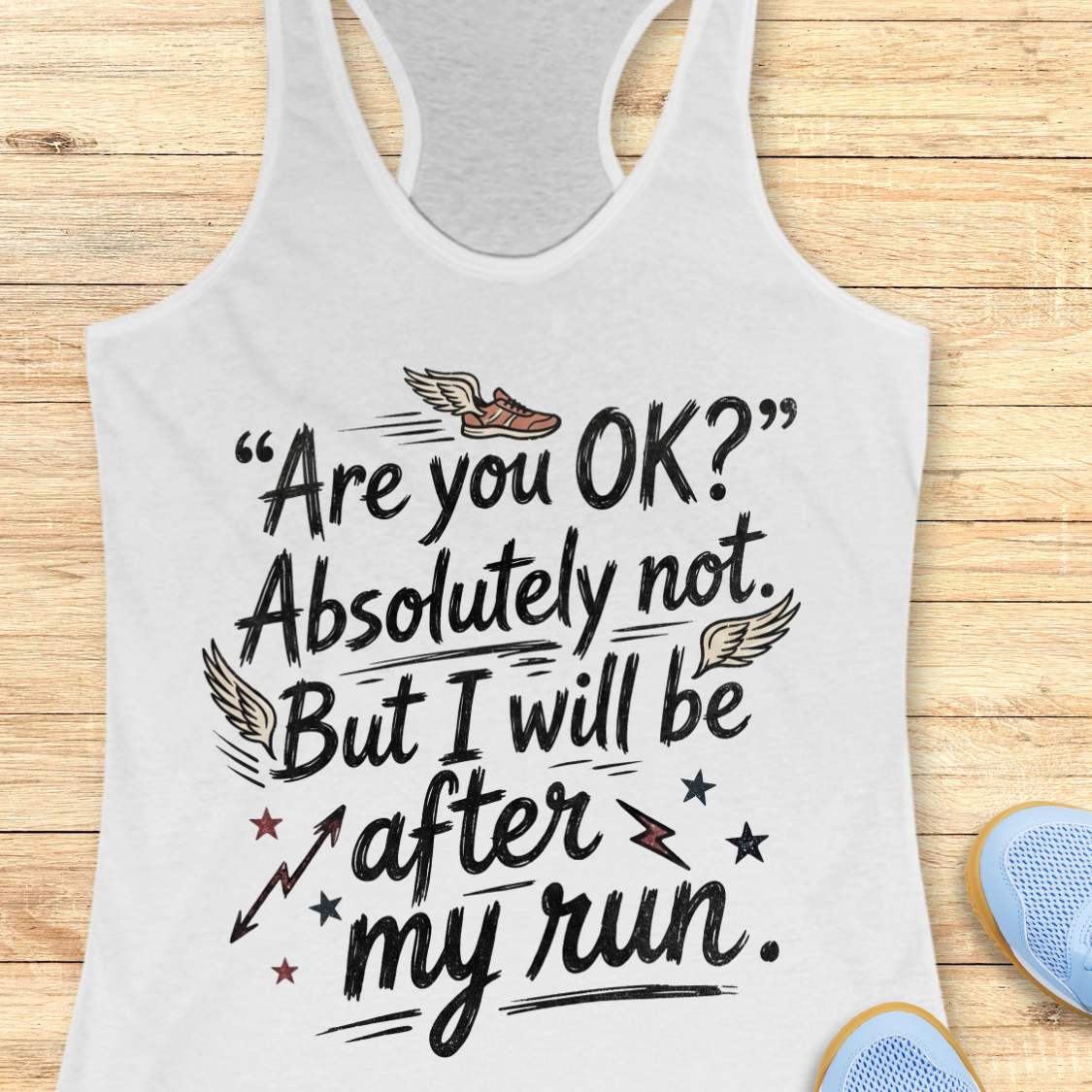 white tank top with humorous running text 'Are you ok? Absolutely not. But I will be after my run.', on a wooden surface