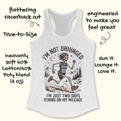 White tank top with graphic design and text 'I'm not unhinged, I'm just two days behind on my mileage', on a white background