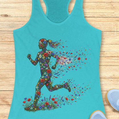 Turquoise tank top with floral running woman design on a wooden surface