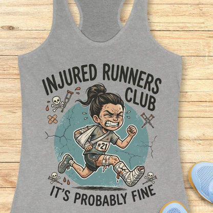 Gray tank top with 'Injured Runners Club' graphic on a wooden surface