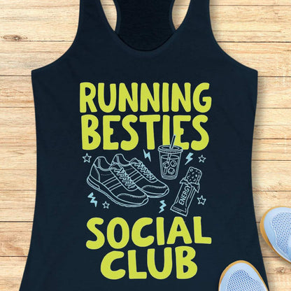 navy tank top with yellow text and graphics on a wooden surface