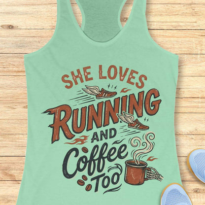 Mint green tank top with 'She loves running and coffee too' text on a wooden surface.