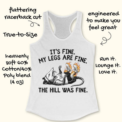 white tank top with black graphic design and text 'it's fine. My legs are fine. The hill was fine.', on a white surface