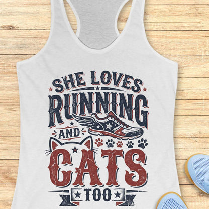 white tank top with graphic design and text 'She loves running and cats too.', on a wooden surface