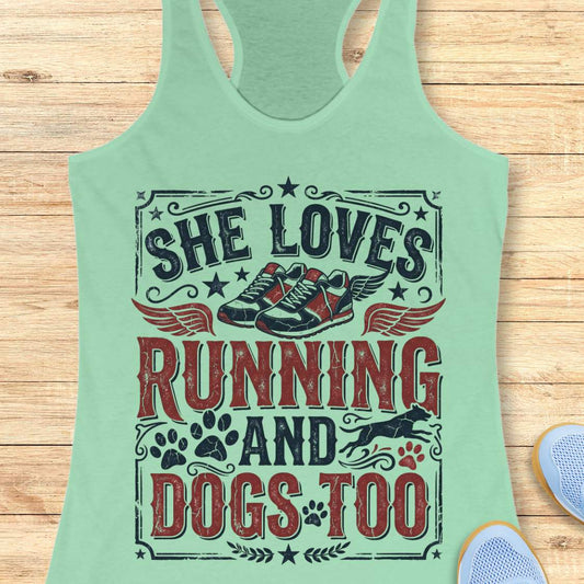 mint tank top with graphic design and text 'She loves running and dogs too.', on a wooden surface