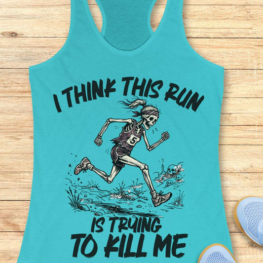 blue tank top with graphic design of a runner skeleton and text 'I think this run is trying to kill me', on a wooden surface