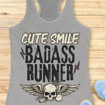 grey tank top with text 'cute smile badass runner, on a wooden surface