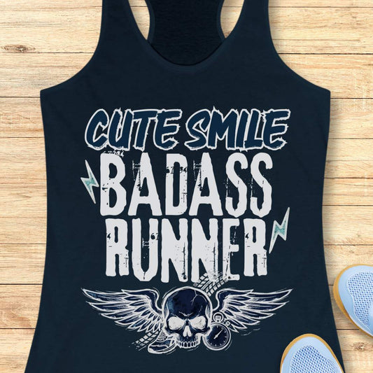 navy tank top with text 'cute smile badass runner, on a wooden surface