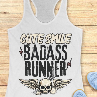 white tank top with text 'cute smile badass runner, on a wooden surface