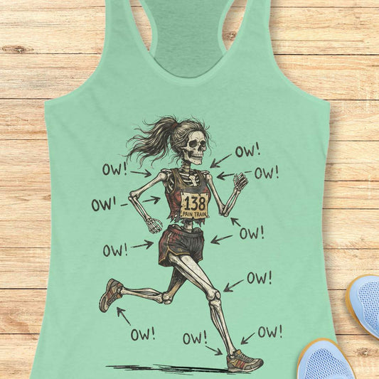 mint tank top with a running skeleton, on a wooden surface