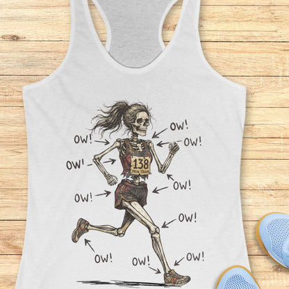 white tank top with a running skeleton, on a wooden surface