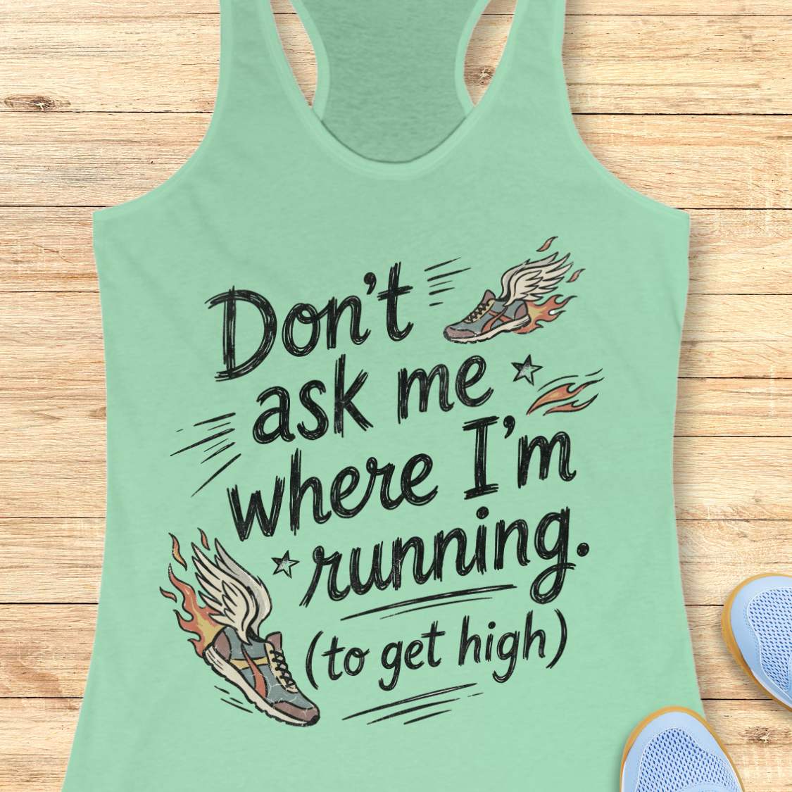 A mint green racerback tank top with a humorous graphic that reads 'Don't ask me where I'm running. (to get high)'.