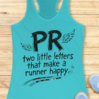 A turquoise racerback tank top with a black graphic print reading 'PR two little letters that make a runner happy' with wings and track lines, laid flat on a light wood background with partial sneakers visible at the edges.