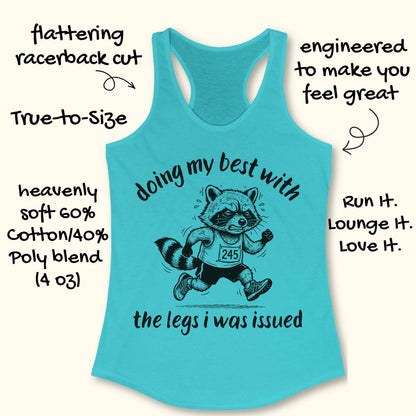 A turquoise racerback tank top with a black graphic of a raccoon runner and the text 'doing my best with the legs i was issued'. Handwritten-style callouts around the shirt describe features like flattering racerback cut, true-to-size, soft cotton/poly blend, and comfort benefits.
