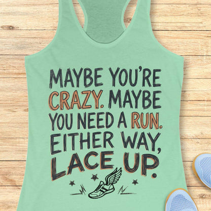 A mint green racerback tank top with a motivational graphic reading 'MAYBE YOU'RE CRAZY. MAYBE YOU NEED A RUN.