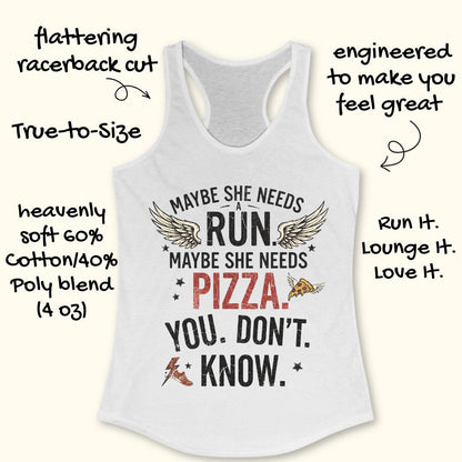 A white racerback tank top laid flat on a light wood background, printed with the phrase “MAYBE SHE NEEDS A RUN. MAYBE SHE NEEDS PIZZA.