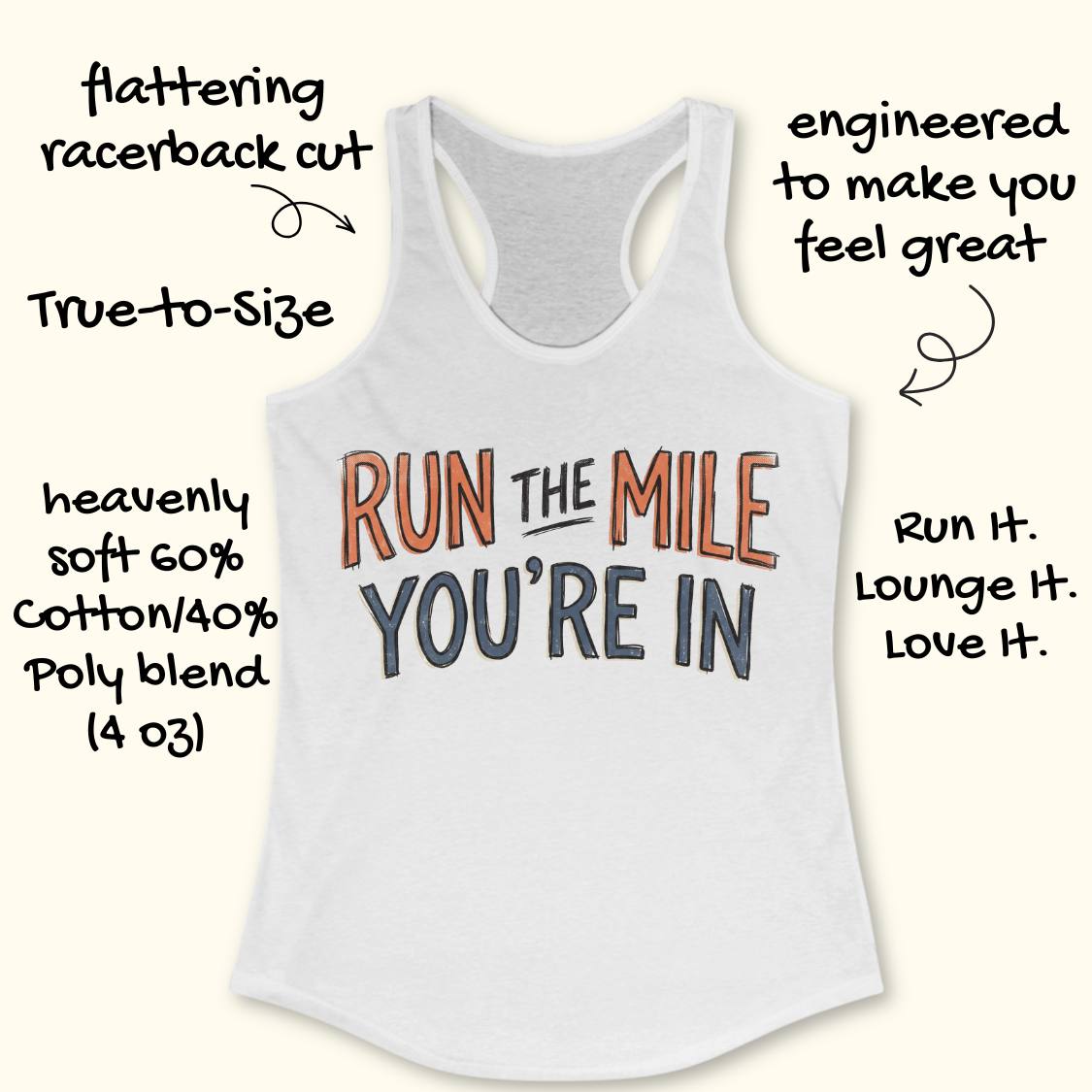 A white racerback tank top laid flat on a light wood background, featuring the motivational text 'RUN THE MILE YOU'RE IN' in orange and dark gray lettering. Partial blue sneakers are visible at the bottom right as styling props.