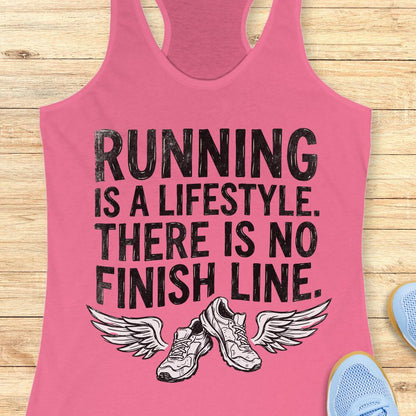 A pink racerback tank top with a black graphic print that reads 'RUNNING IS A LIFESTYLE. THERE IS NO FINISH LINE.