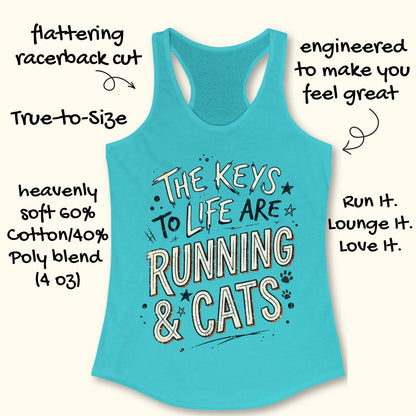 A blue racerback tank top laid flat on a light wood surface, featuring the phrase 'THE KEYS TO LIFE ARE RUNNING & CATS' in white and blue outlined lettering with small paw print and star accents. Part of a light blue shoe is visible at the bottom right.
