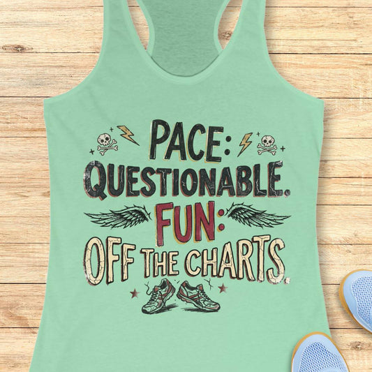 A mint green racerback tank top laid flat on a light wood background, featuring a graphic print that reads 'PACE: QUESTIONABLE. FUN: OFF THE CHARTS.