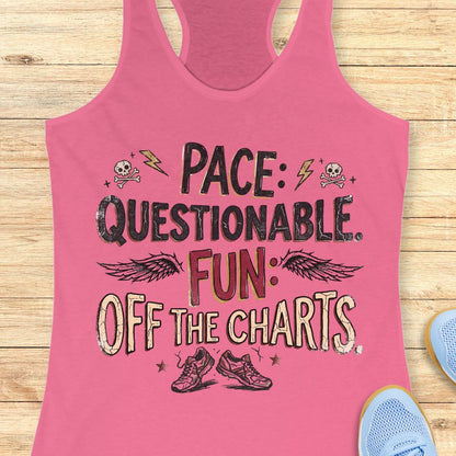 A pink racerback tank top laid flat on a light wood background, featuring the graphic text 'PACE: QUESTIONABLE. FUN: OFF THE CHARTS.