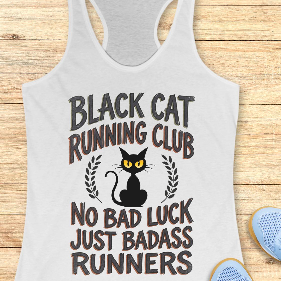 A white racerback tank top laid flat on a light wood background, featuring a black cat graphic with yellow eyes and the text 'BLACK CAT RUNNING CLUB NO BAD LUCK JUST BADASS RUNNERS.' Partial blue shoes are visible at the bottom right as styling props.