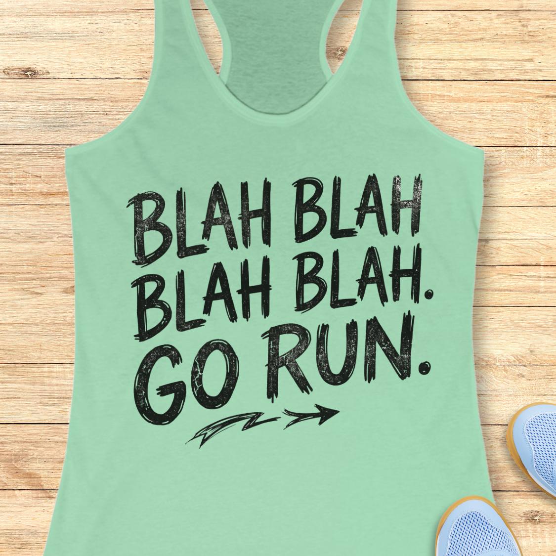 A mint racerback tank top with a black distressed graphic that reads 'BLAH BLAH BLAH BLAH. GO RUN.