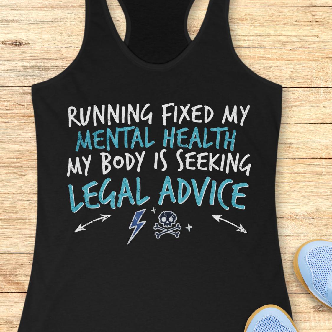 A black racerback tank top laid flat on a light wood background, featuring a graphic text print that reads 'RUNNING FIXED MY MENTAL HEALTH MY BODY IS SEEKING LEGAL ADVICE' in white and light blue lettering, with small lightning bolt, skull and crossbones, and arrow icons below.