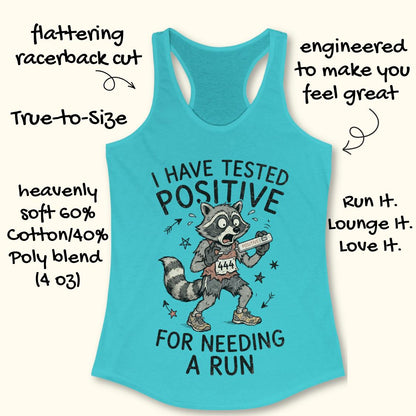 A turquoise racerback tank top with a cartoon raccoon graphic and the text 'I HAVE TESTED POSITIVE FOR NEEDING A RUN' on a light beige background, surrounded by promotional handwritten-style callouts.